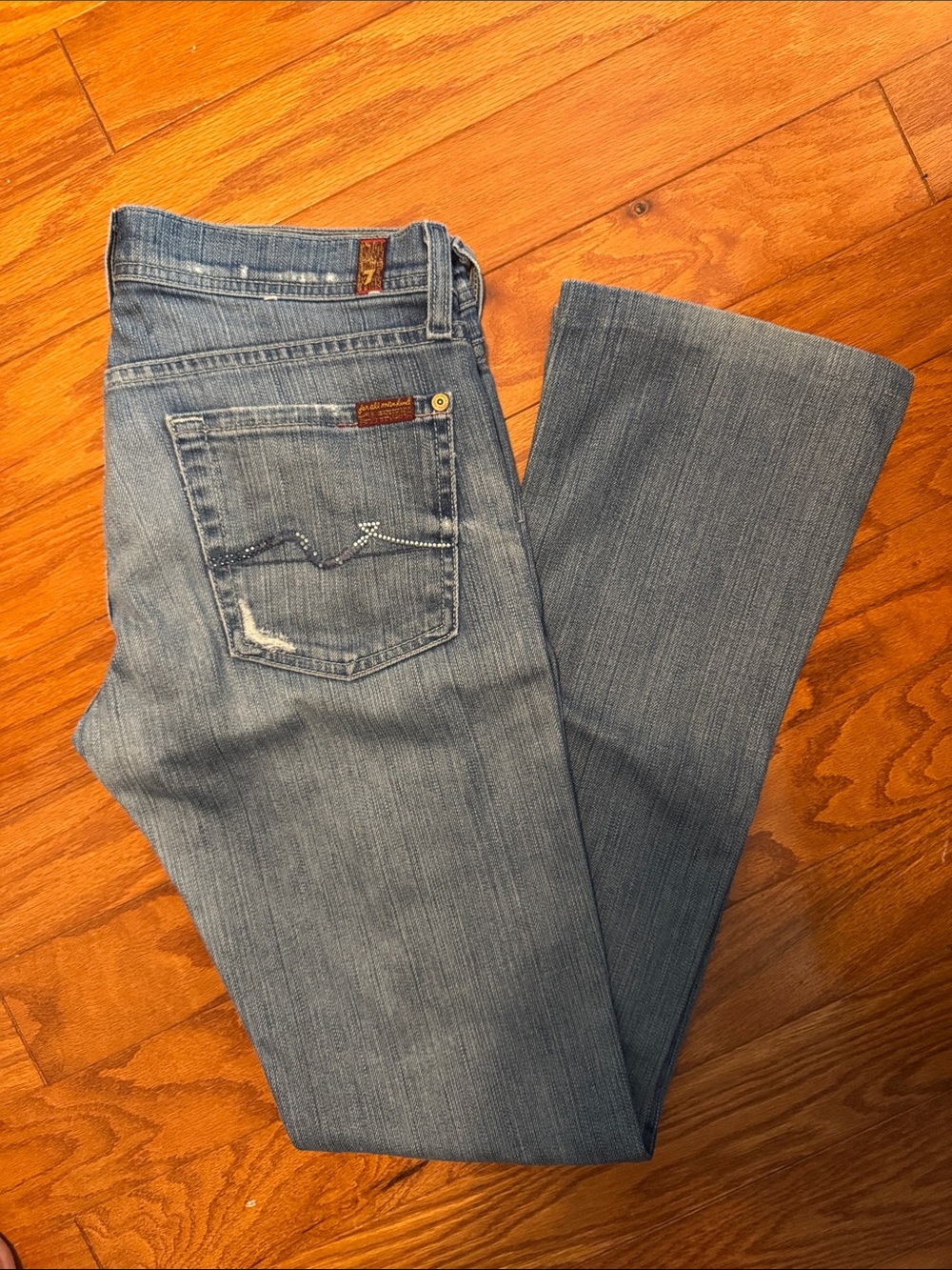 7 For All Mankind Light Blue Bootcut Jeans with Subtle Whiskering